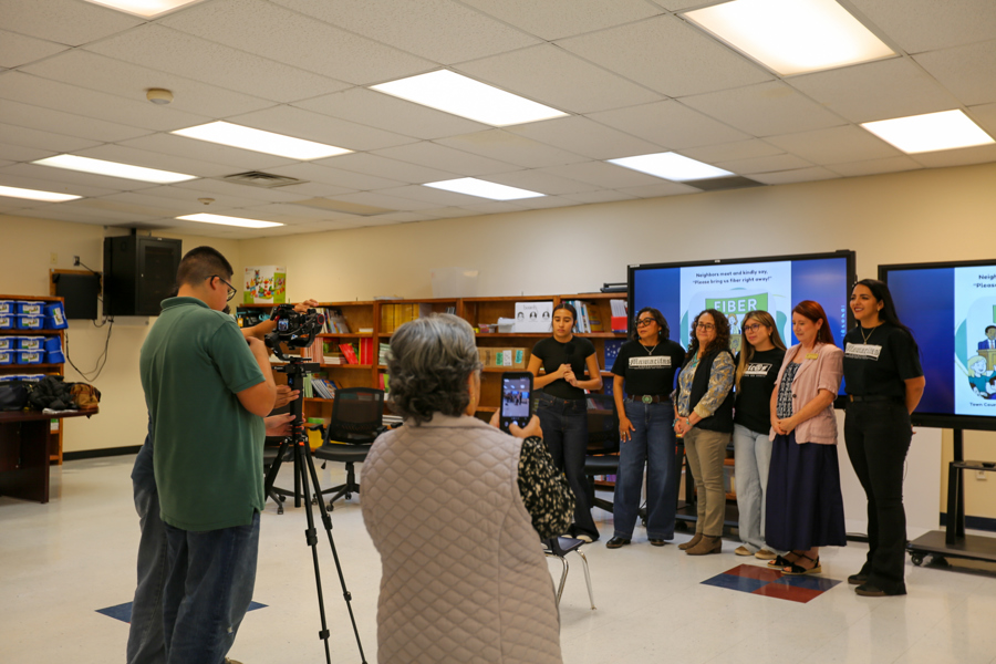 Readers and partners line up for a group interview with Warrior Media.