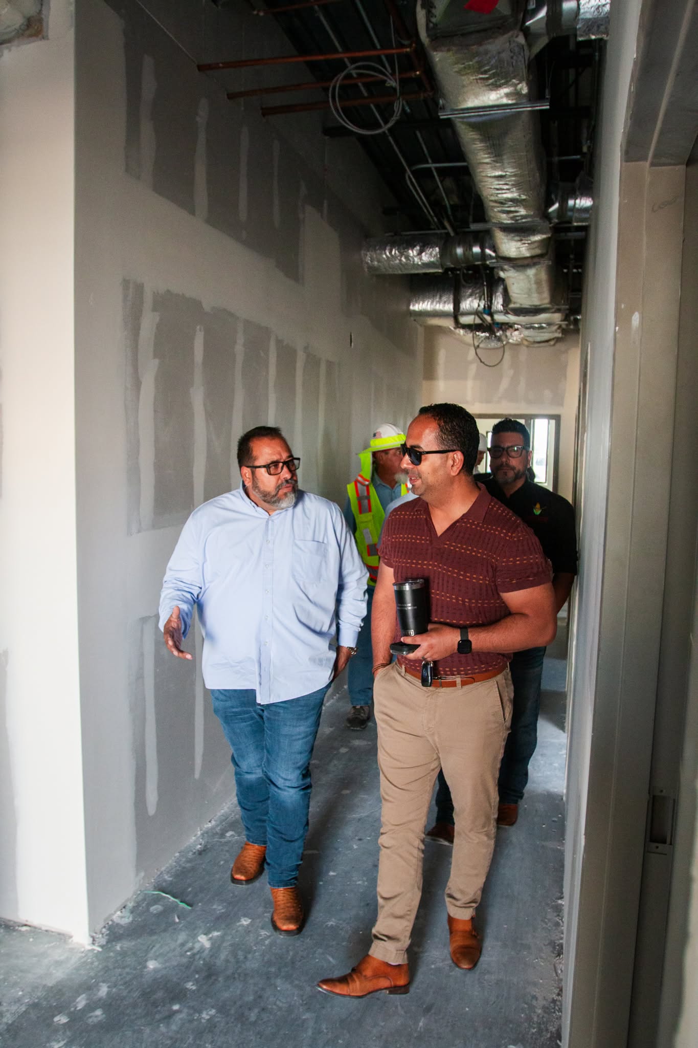 Attendees walking through the future distribution space