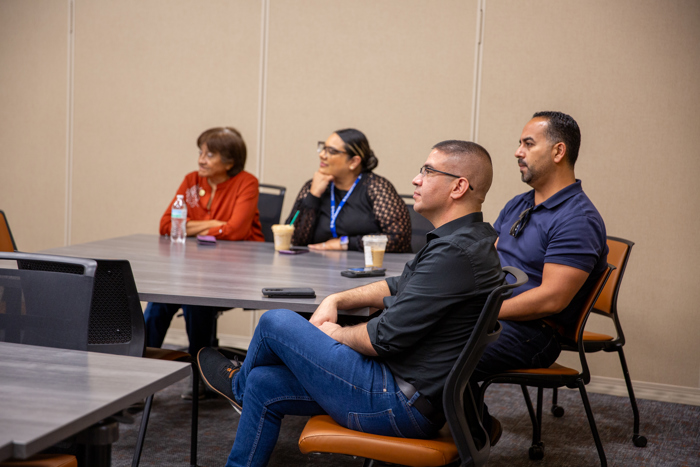 Attendees take part in the discussion.