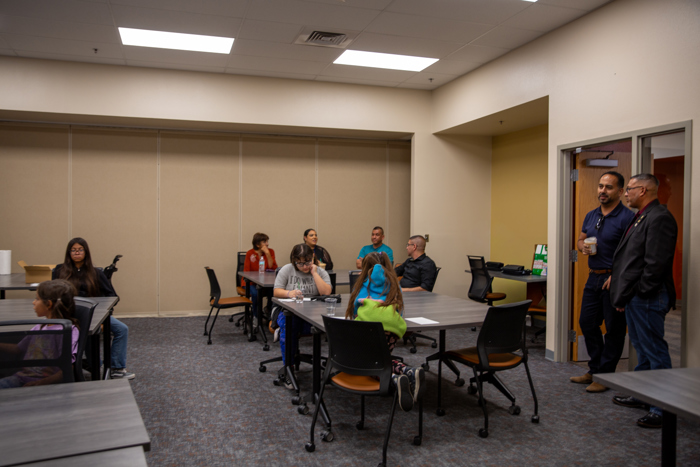 Attendees gather in the workshop room.