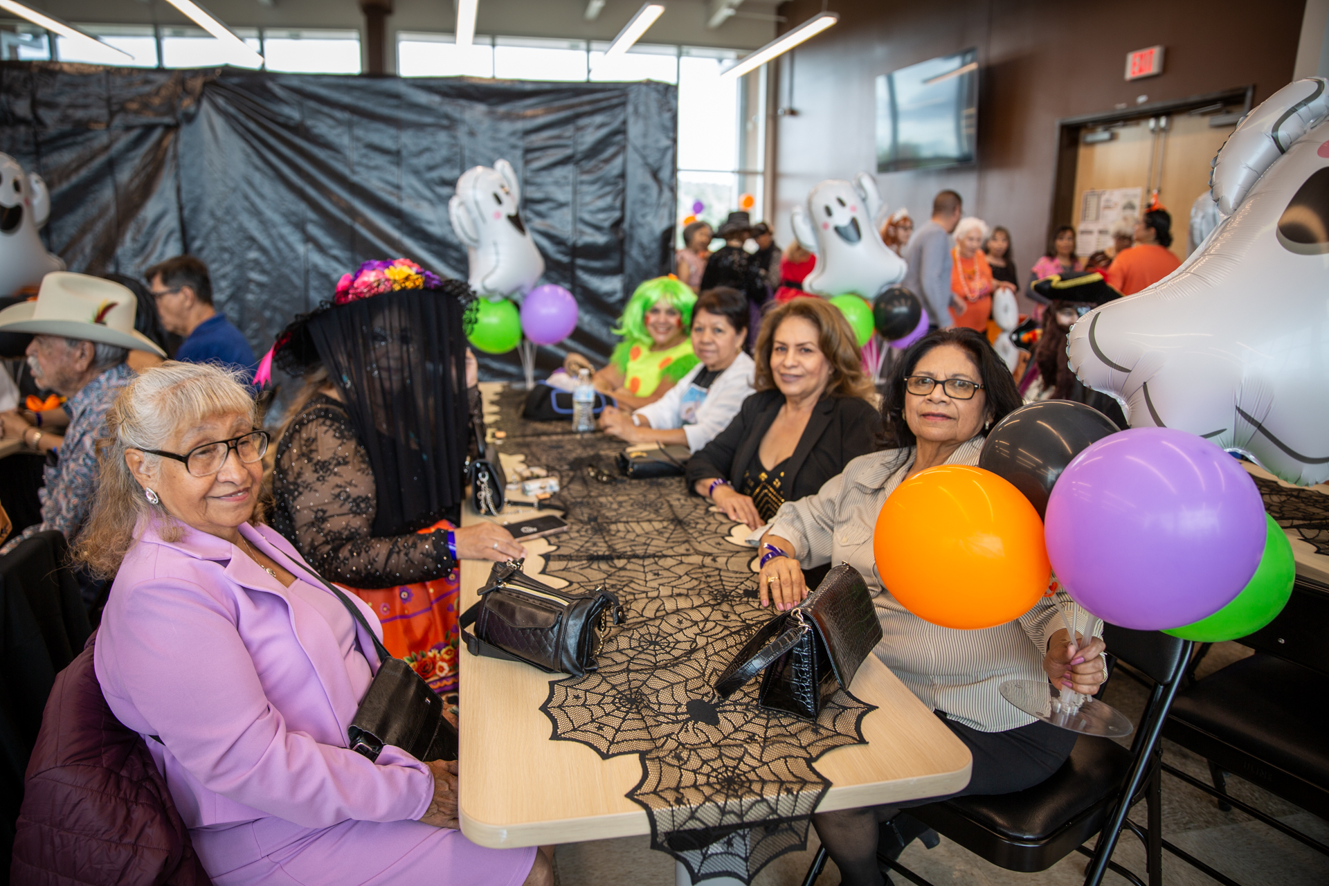 Seniors enjoying the party at their tables