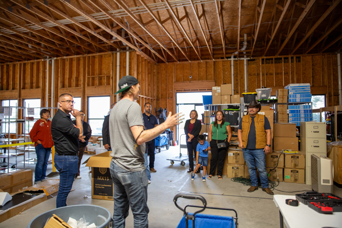 A speaker shares information about the warehouse space.