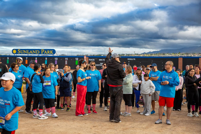 Runners gather on the track before the race