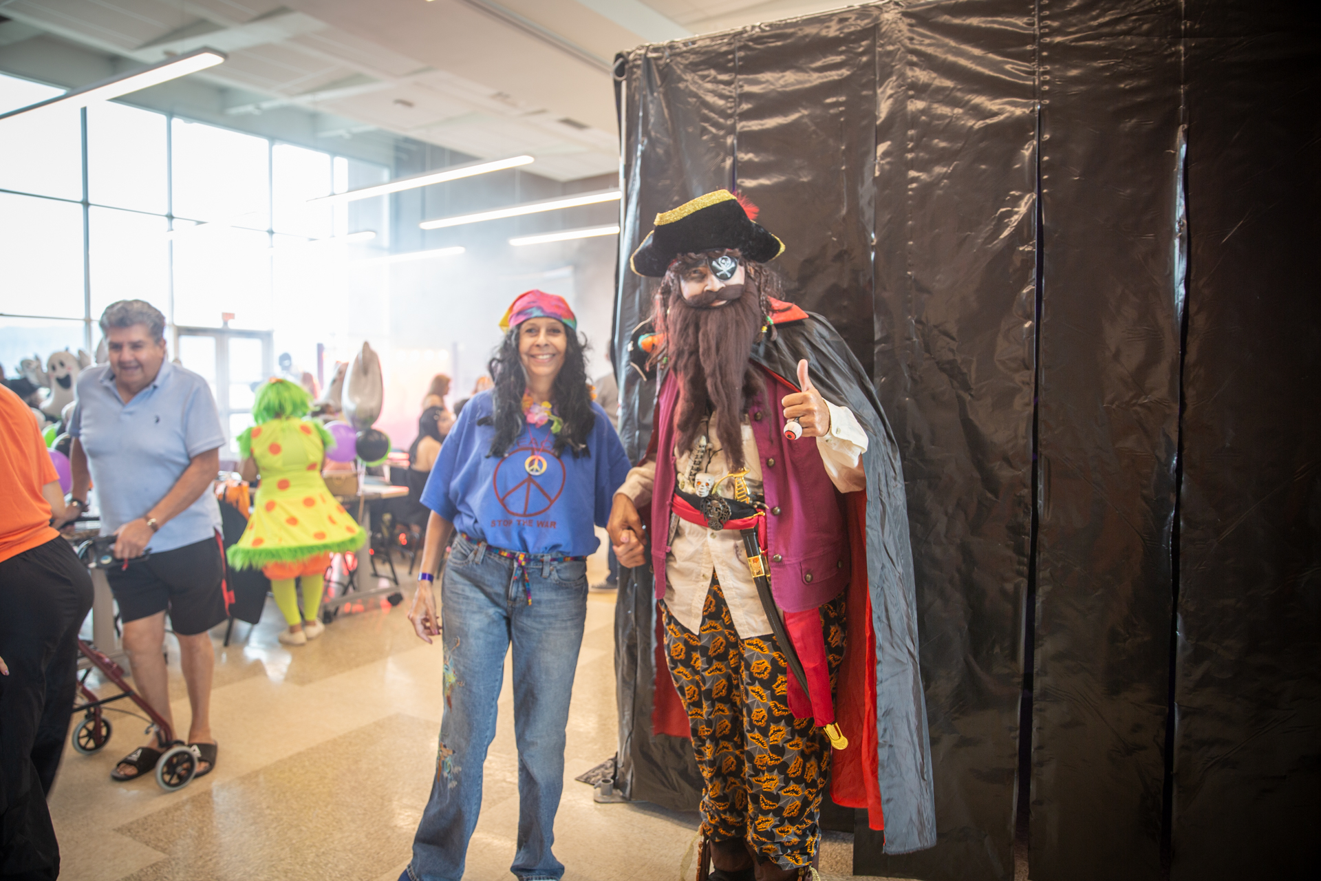 Costumed guests near the haunted house