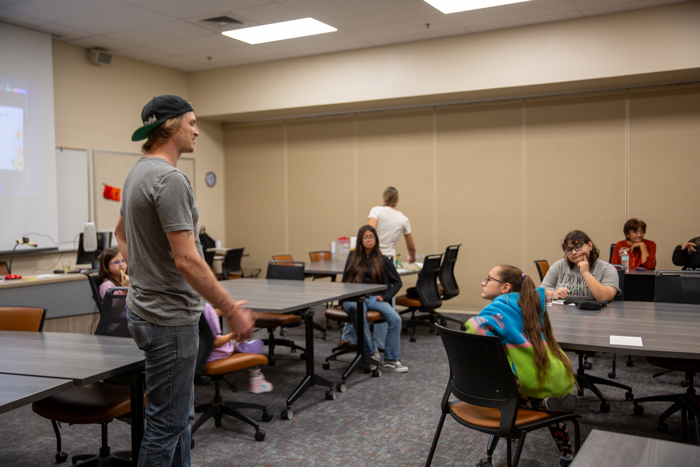 A speaker addresses the group during the workshop.
