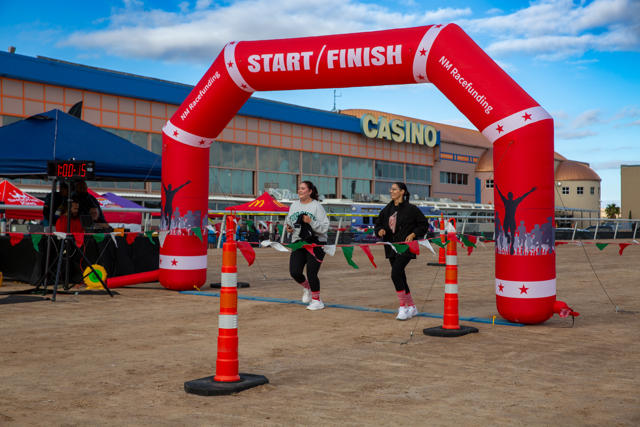 Participants head toward the start/finish arch