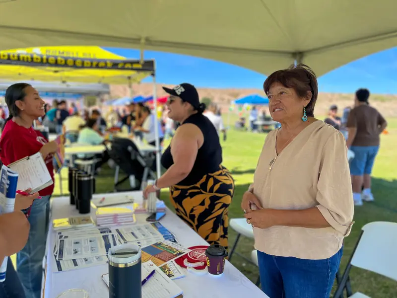 Residents learn about the Youth Center at the festival